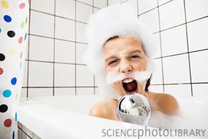 Boy playing in bubble bath