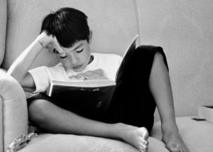 Child reading | Books and Beyond – Don’t Let Your Reluctant Reader Miss Out | Habyts