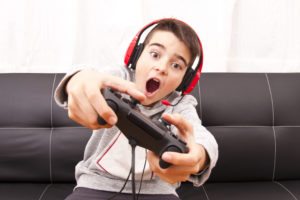 Tween playing video game | 5 Shocking Facts About Screen Time and Kids Health | Habyts